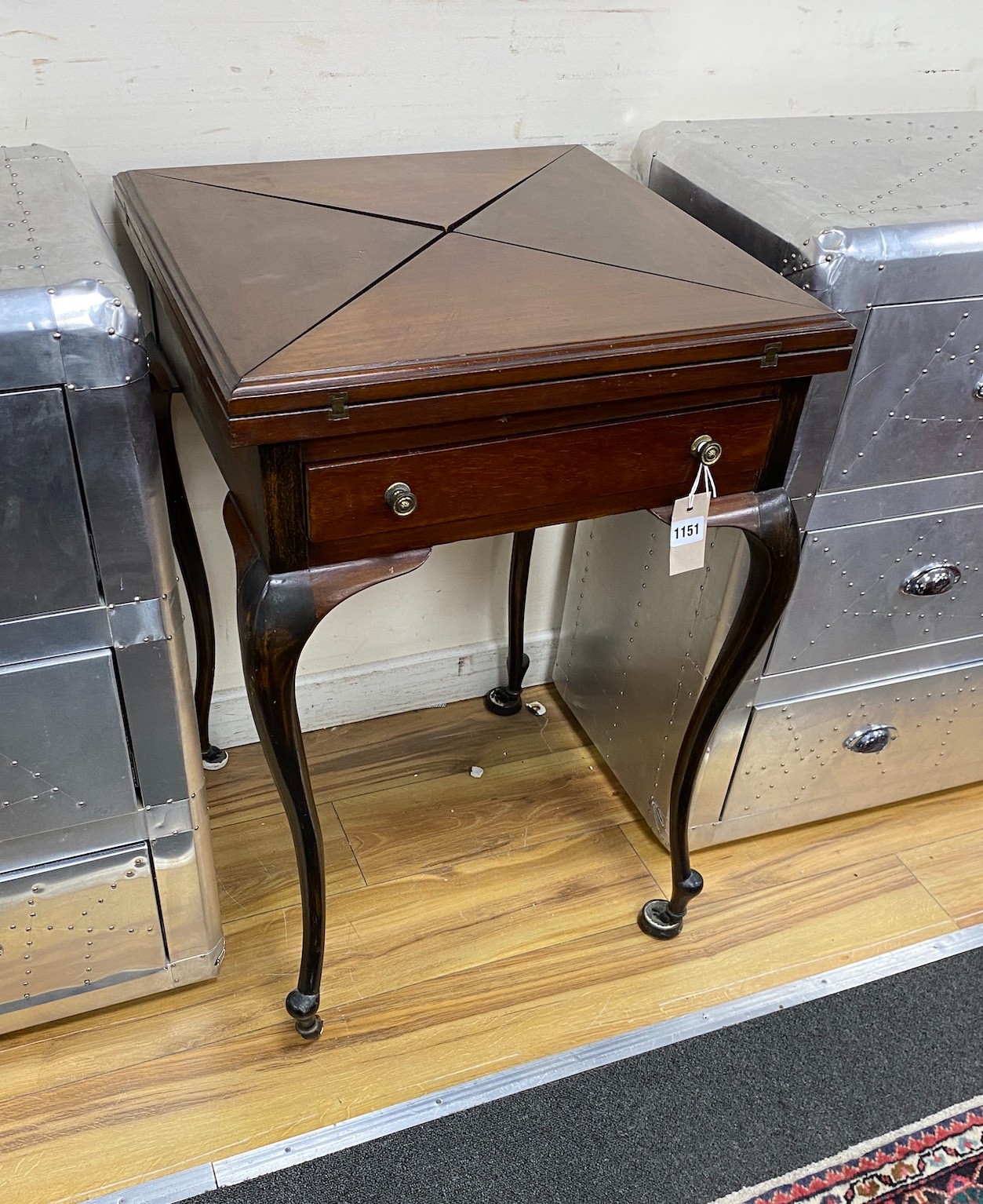 An Edwardian mahogany envelope card table, width 51cm
